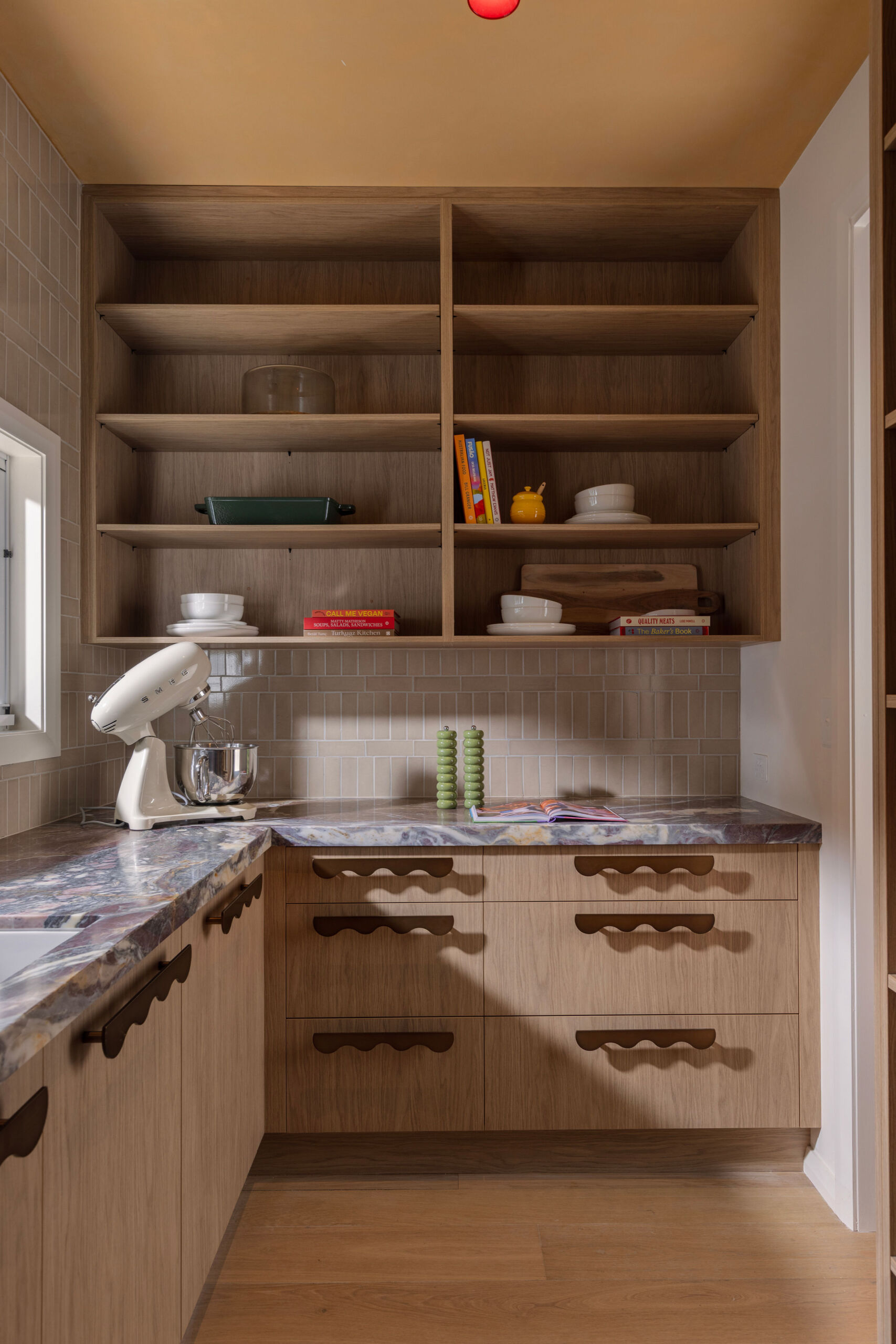 Timber-look cabinetry in a butler's pantry