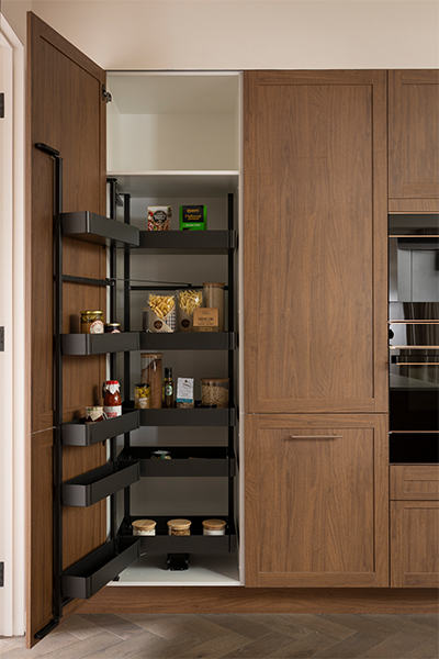 Häfele Tandem Side pull-out pantry seamlessly integrated within the cabinetry, offering organised and accessible kitchen storage.