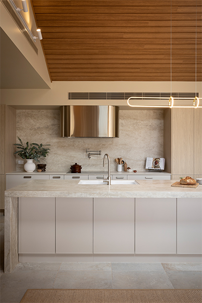 modern-coastal-kitchen-with-warm-white-cabinets-and-silver-curved-rangehood-The-Block-2025-House-3