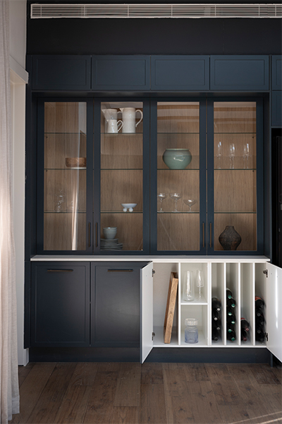 Display cabinets with Nordic Oak interiors, glass shelves, and framed glass doors combine style with storage functionality.