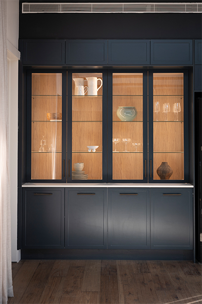 Warm LED and Flexi LED lighting illuminate display cabinetry and benchtops, highlighting timber interiors.